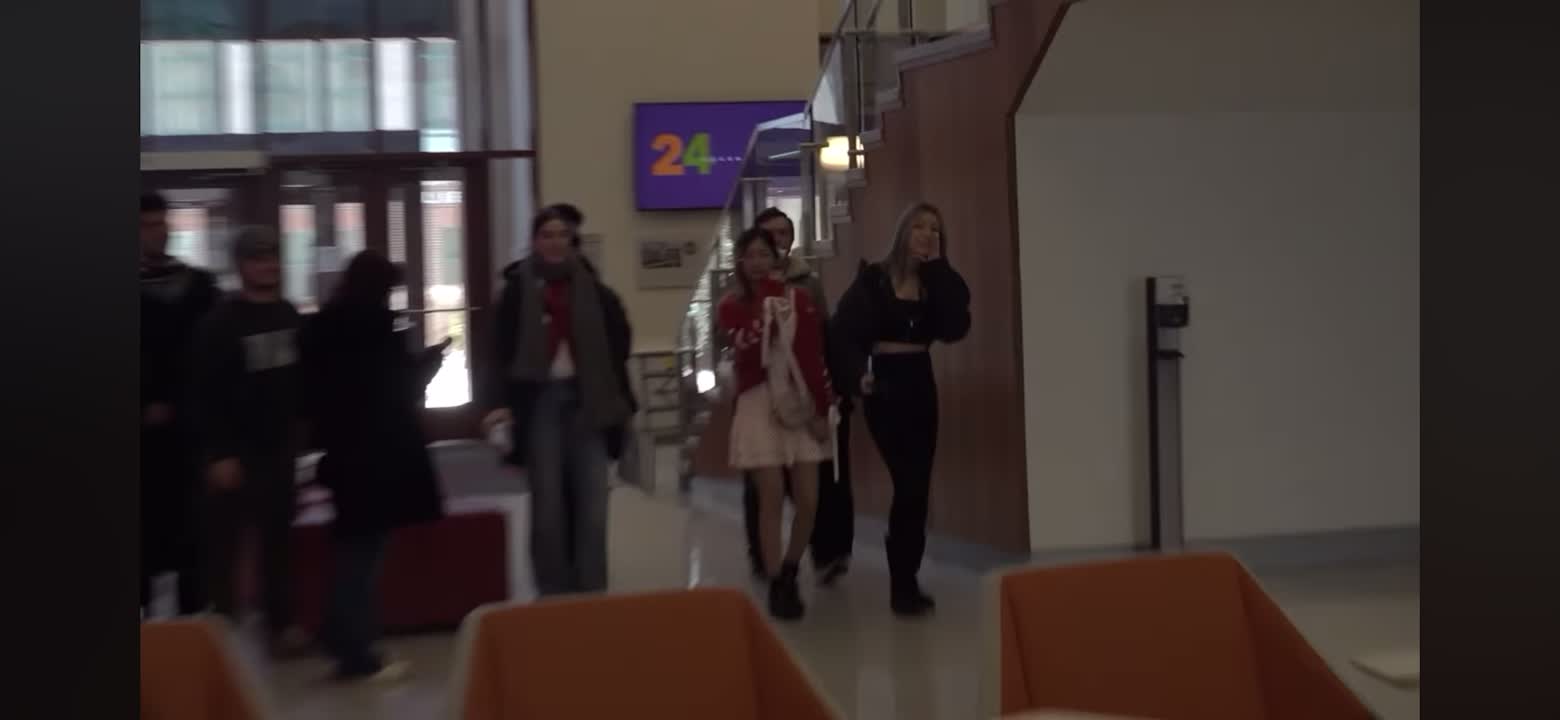 Campus lobby scene from Battle of the Schools